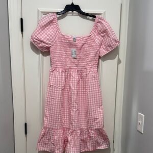 Pink women’s dress. New with tags.